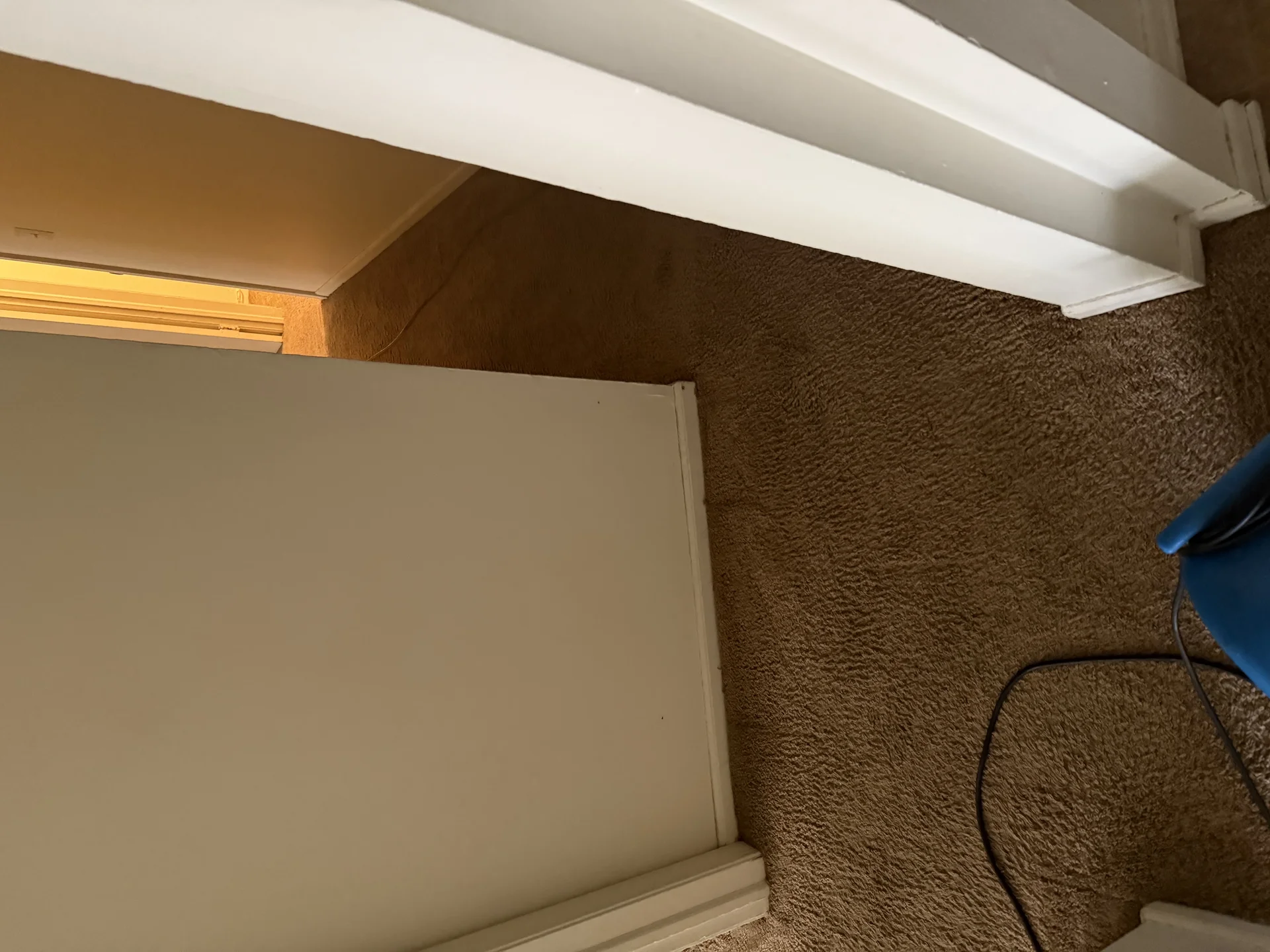 Custom built-in shelving with textured wall finish and recessed lighting installation by SF Construction in Westborough, MA